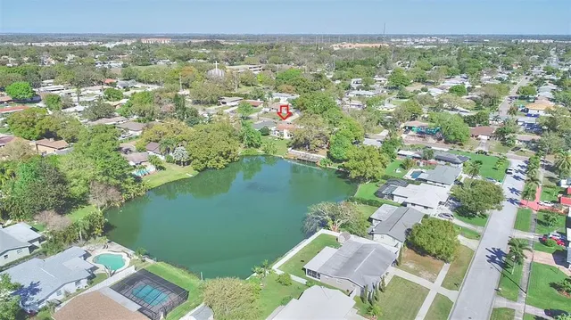 a view of a lake with a city