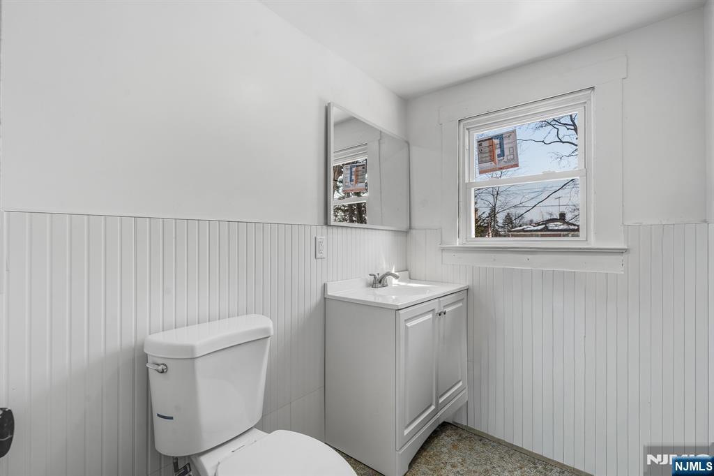 60 Stanley Road South Orange, NJ 07079 - Photo 11 of 40 a bathroom with a toilet a sink and mirror
