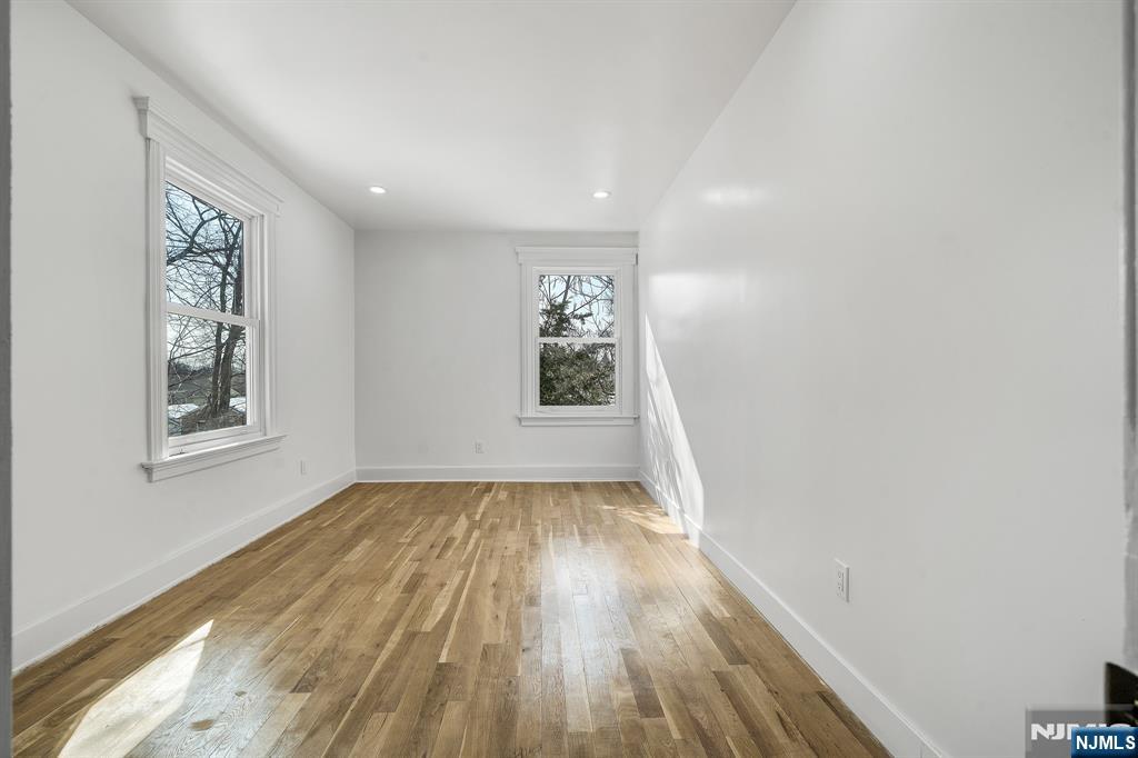 60 Stanley Road South Orange, NJ 07079 - Photo 12 of 40 a view of empty room with wooden floor and fan