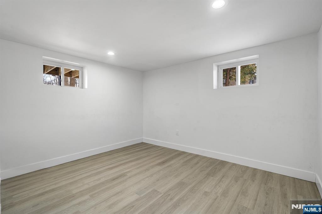 60 Stanley Road South Orange, NJ 07079 - Photo 23 of 40 a view of a room with wooden floor and white walls
