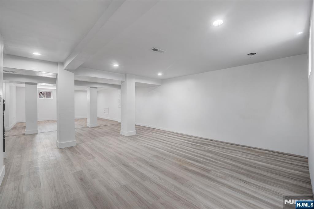 60 Stanley Road South Orange, NJ 07079 - Photo 25 of 40 a view of an empty room with wooden floor