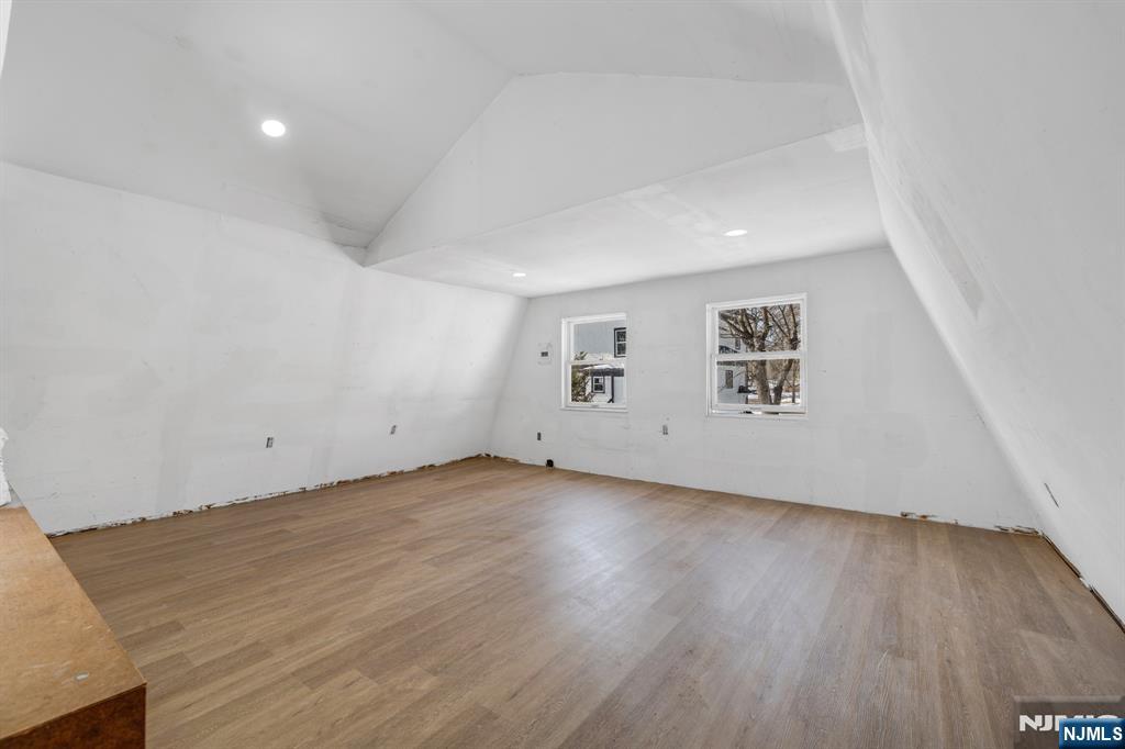 60 Stanley Road South Orange, NJ 07079 - Photo 27 of 40 an empty room with wooden floor and windows