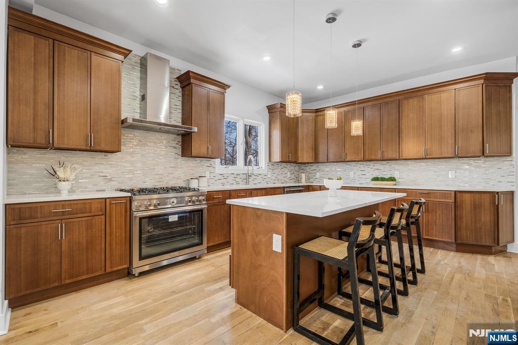 60 Stanley Road South Orange, NJ 07079 - Photo 8 of 40 a kitchen with stainless steel appliances granite countertop wooden cabinets a sink and a stove