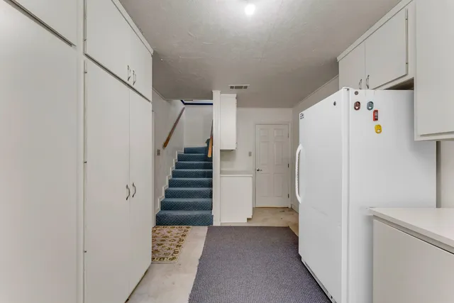 a view of an entryway with staircase