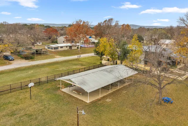 a view of a swimming pool with an ocean view