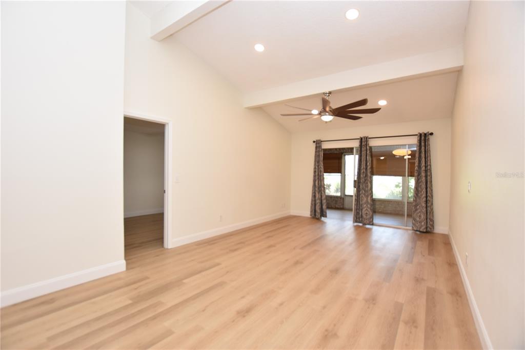 2025 Sylvester Road, Unit S2 Lakeland, FL 33803 - Photo 22 of 36 a view of an empty room with wooden floor