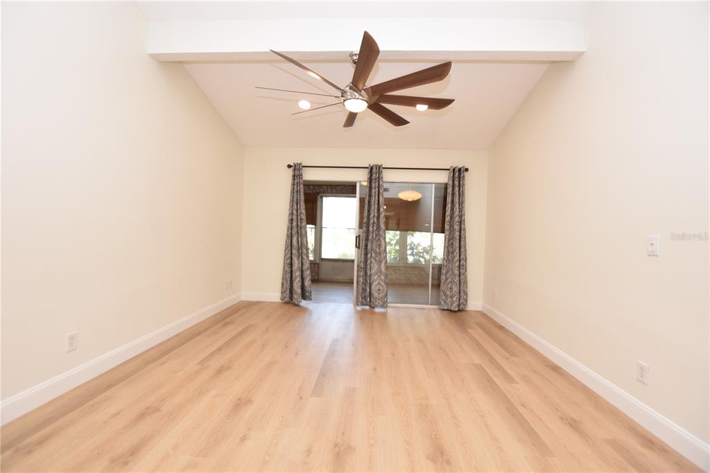 2025 Sylvester Road, Unit S2 Lakeland, FL 33803 - Photo 23 of 36 a view of empty room with wooden floor