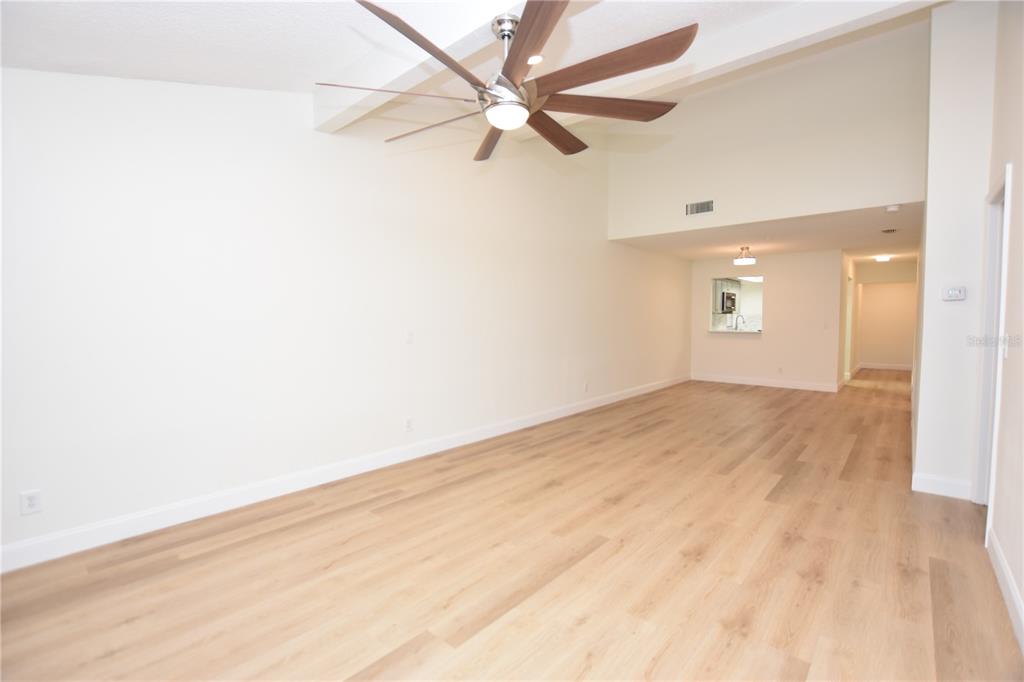 2025 Sylvester Road, Unit S2 Lakeland, FL 33803 - Photo 24 of 36 a view of empty room with wooden floor