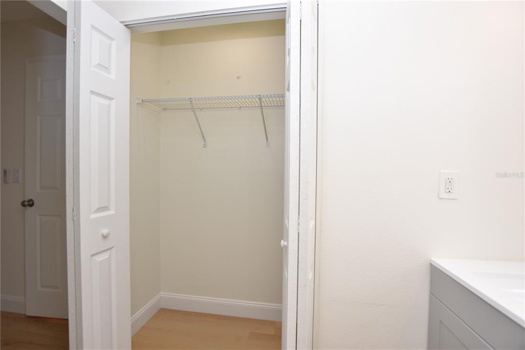 2025 Sylvester Road, Unit S2 Lakeland, FL 33803 - Photo 26 of 36 a bathroom with a glass shower door