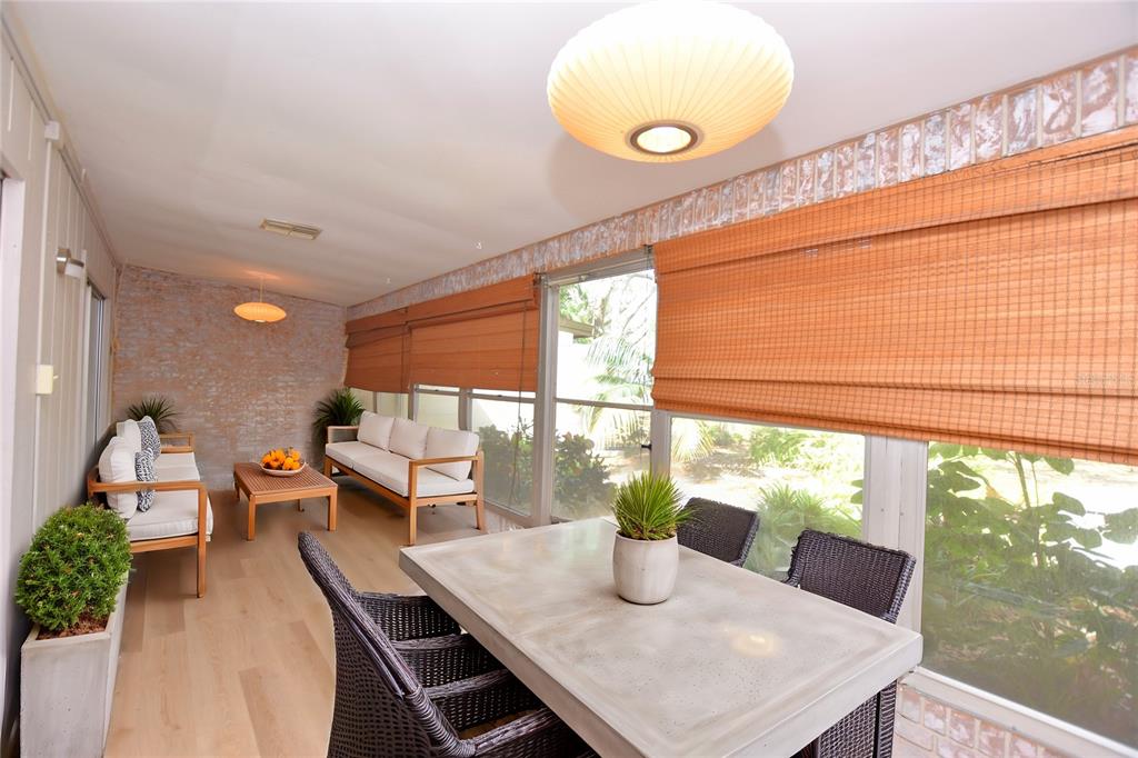 2025 Sylvester Road, Unit S2 Lakeland, FL 33803 - Photo 29 of 36 a view of a dining room with furniture window and outside view