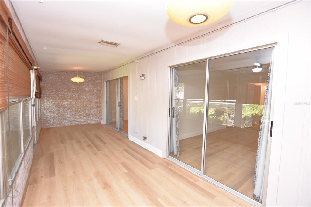 2025 Sylvester Road, Unit S2 Lakeland, FL 33803 - Photo 31 of 36 a bathroom with a shower and a glass door