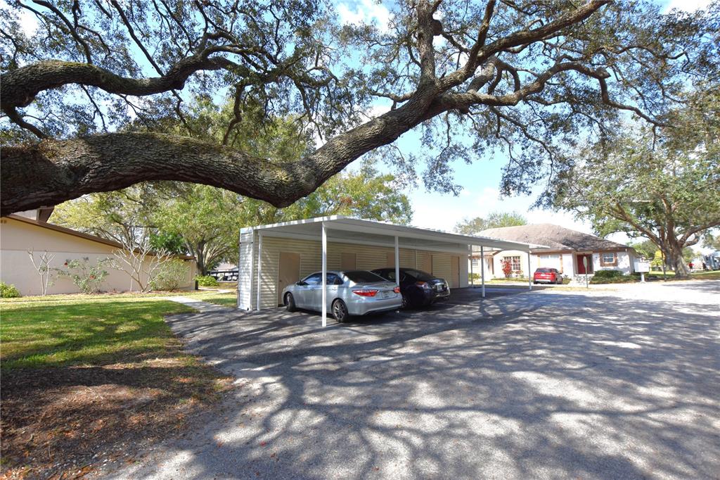 2025 Sylvester Road, Unit S2 Lakeland, FL 33803 - Photo 33 of 36 a view of a house with a yard
