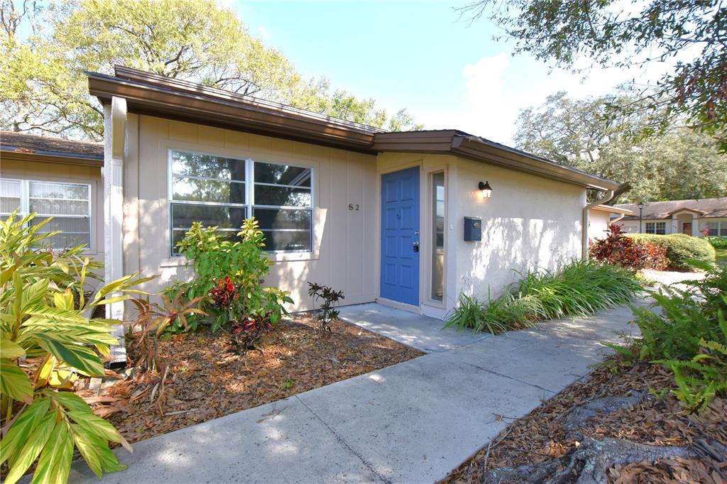 2025 Sylvester Road, Unit S2 Lakeland, FL 33803 - Photo 35 of 36 a front view of a house with garden