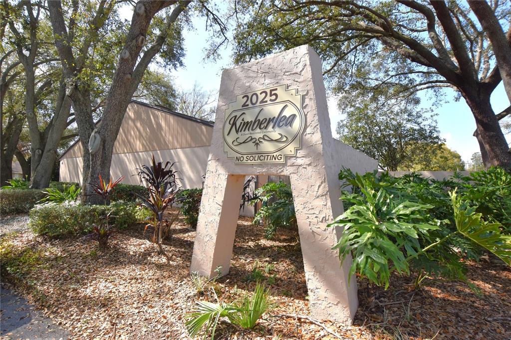 2025 Sylvester Road, Unit S2 Lakeland, FL 33803 - Photo 36 of 36 a view of a yard with plants and trees