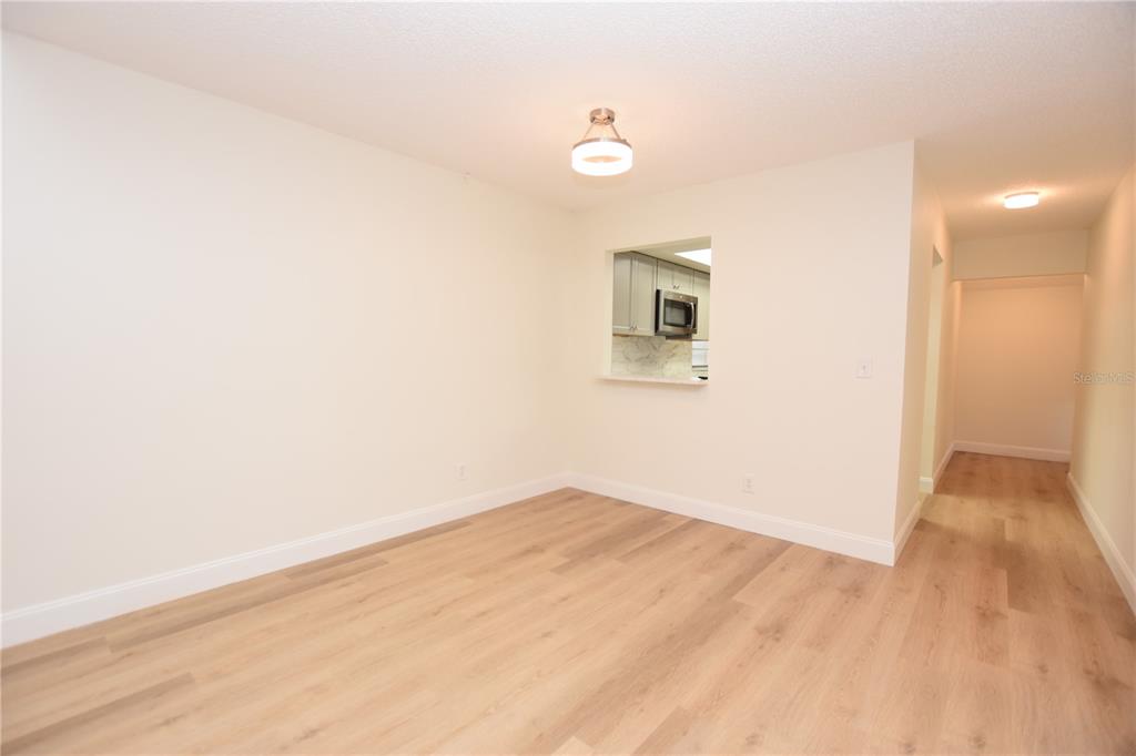 2025 Sylvester Road, Unit S2 Lakeland, FL 33803 - Photo 8 of 36 a view of empty room with wooden floor
