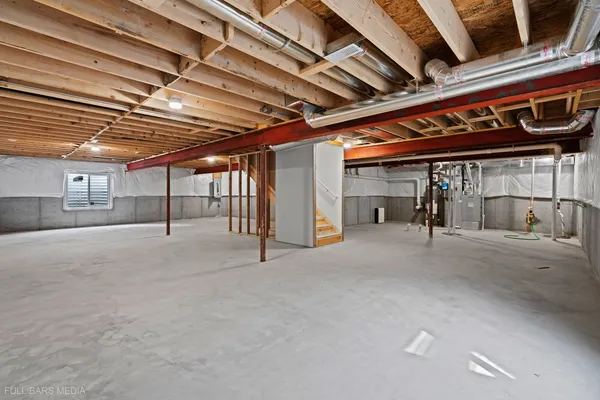 a view of a room with wooden ceiling