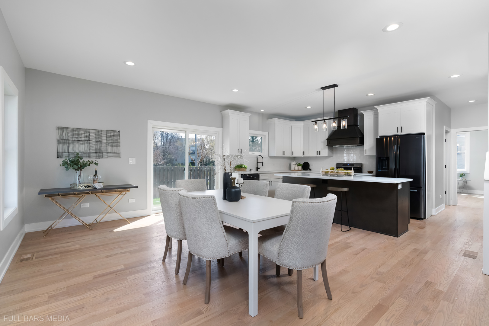 4019 Faith Lane St. Charles, IL 60174 - Photo 7 of 38 a view of kitchen with refrigerator dining table and chairs
