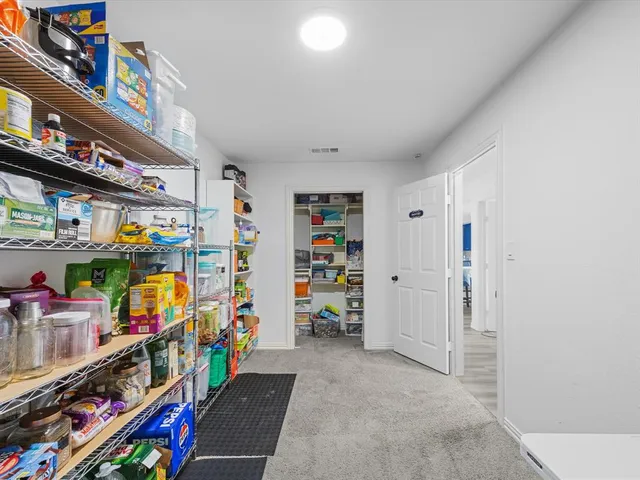 a black and white photo of a bench