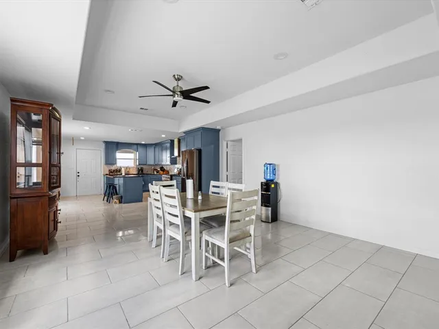 a view of a dining room kitchen and a window