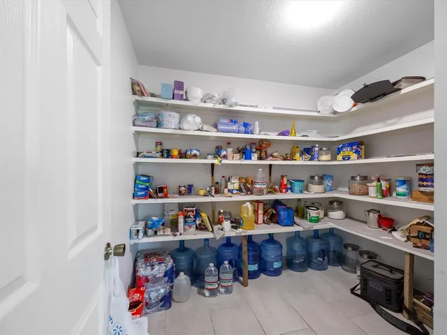 a room with storage and utility