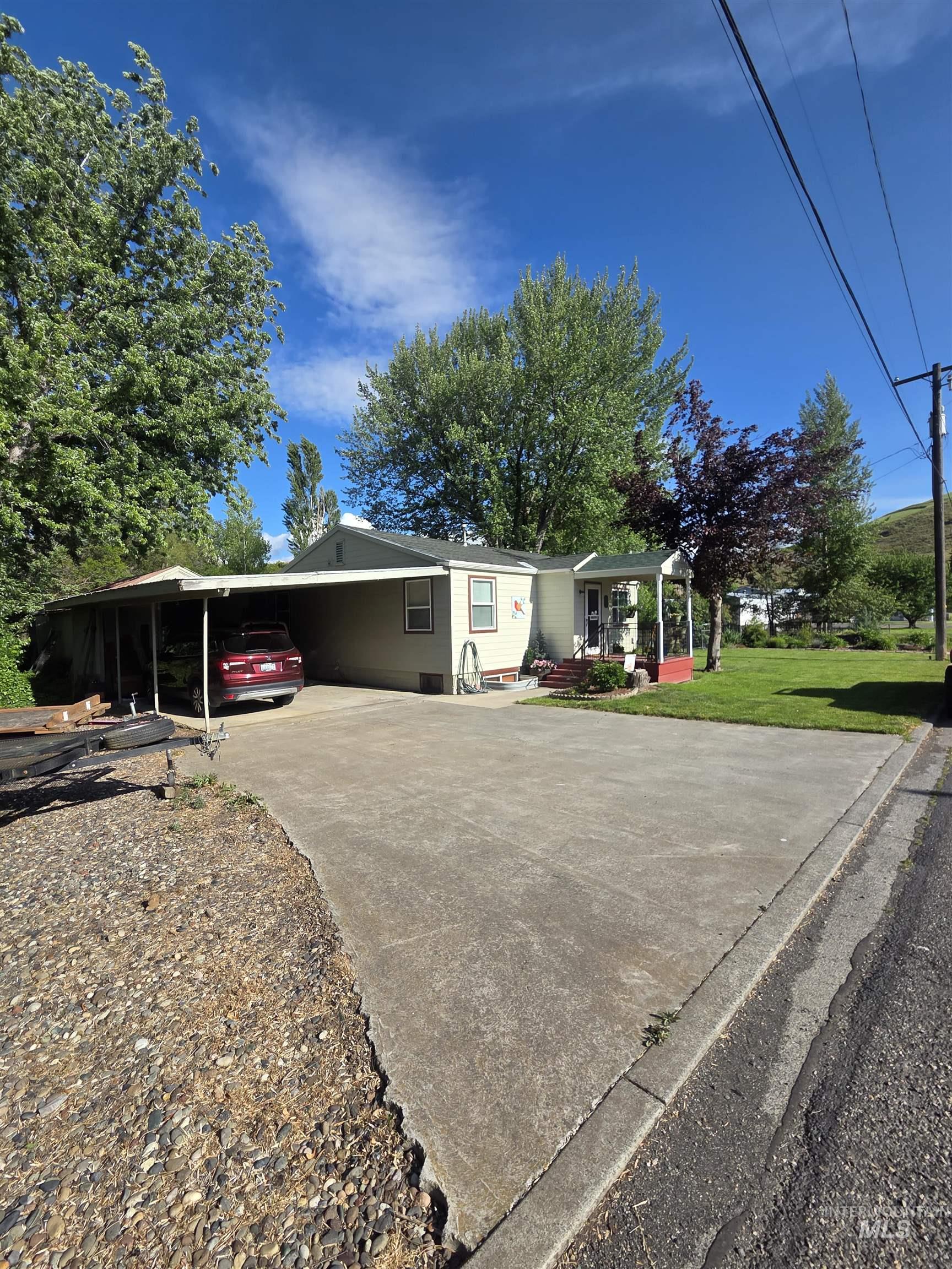 109 South 3rd Street Pomeroy, WA 99347 - Photo 2 of 36 Single-story residence featuring a carport, concrete driveway, and covered front entry