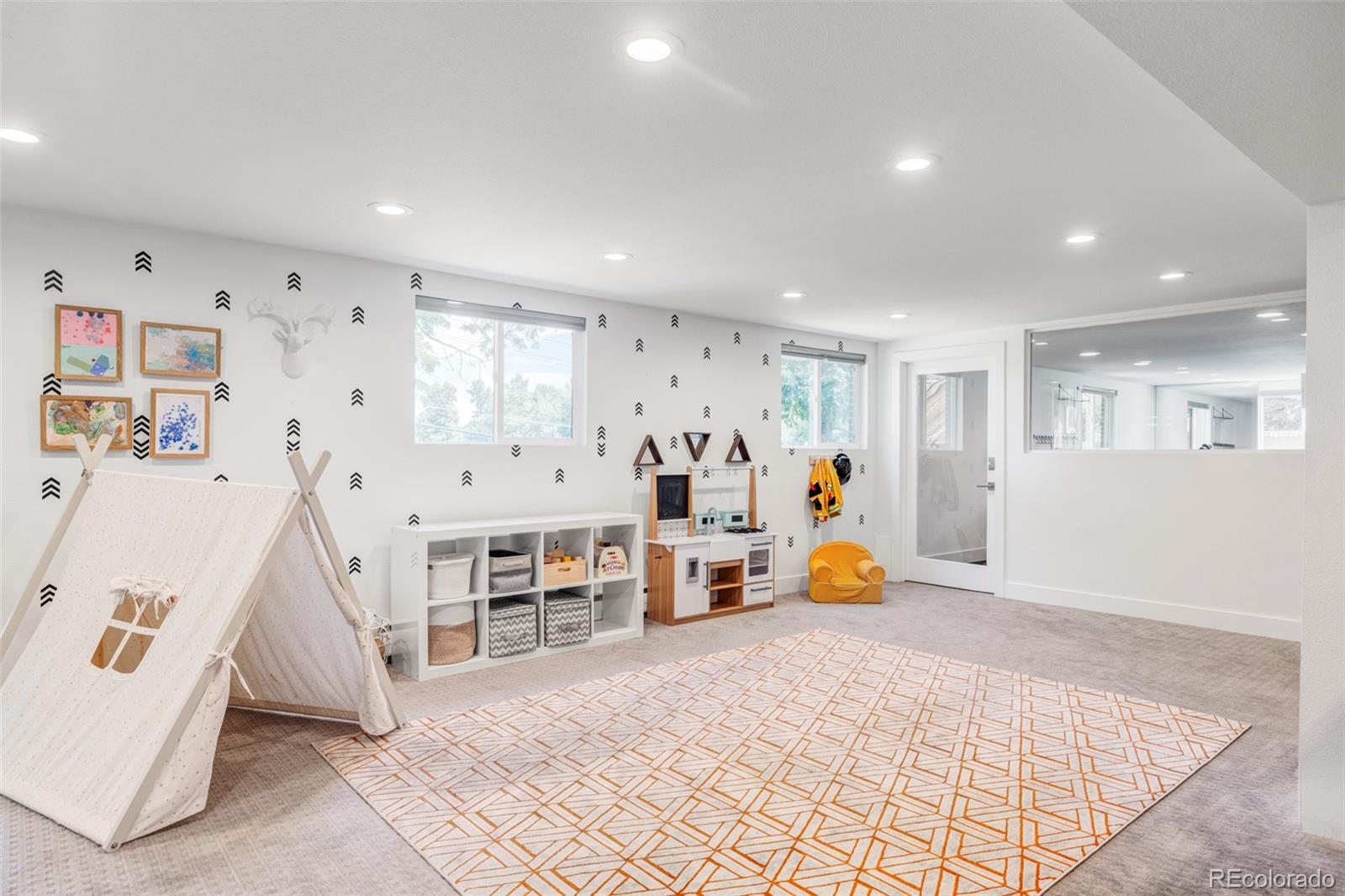 3370 Ward Road Wheat Ridge, CO 80033 - Photo 34 of 42 a bed room with a bed and furniture