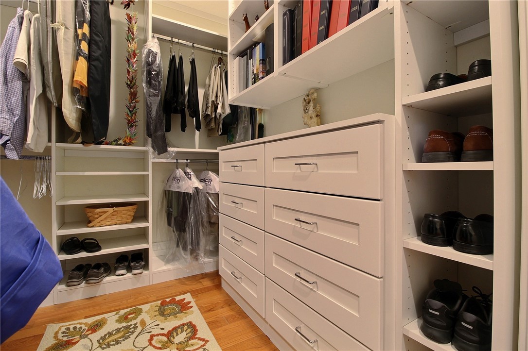 3 Compass Way, Unit B 102 Westerly, RI 02891 - Photo 33 of 38 custom built-in closet with pocket door