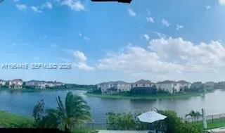 a view of a lake with a city view