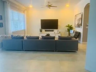 a living room with hard wood floor