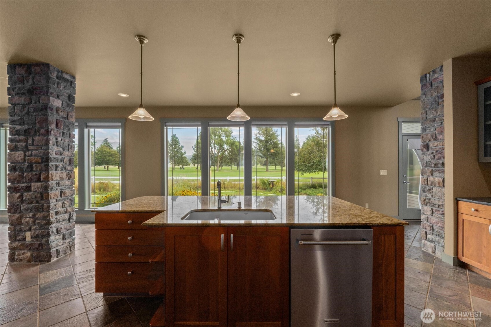 1900 Tamarack Street Colville, WA 99114 - Photo 13 of 40 a view of center island with windows