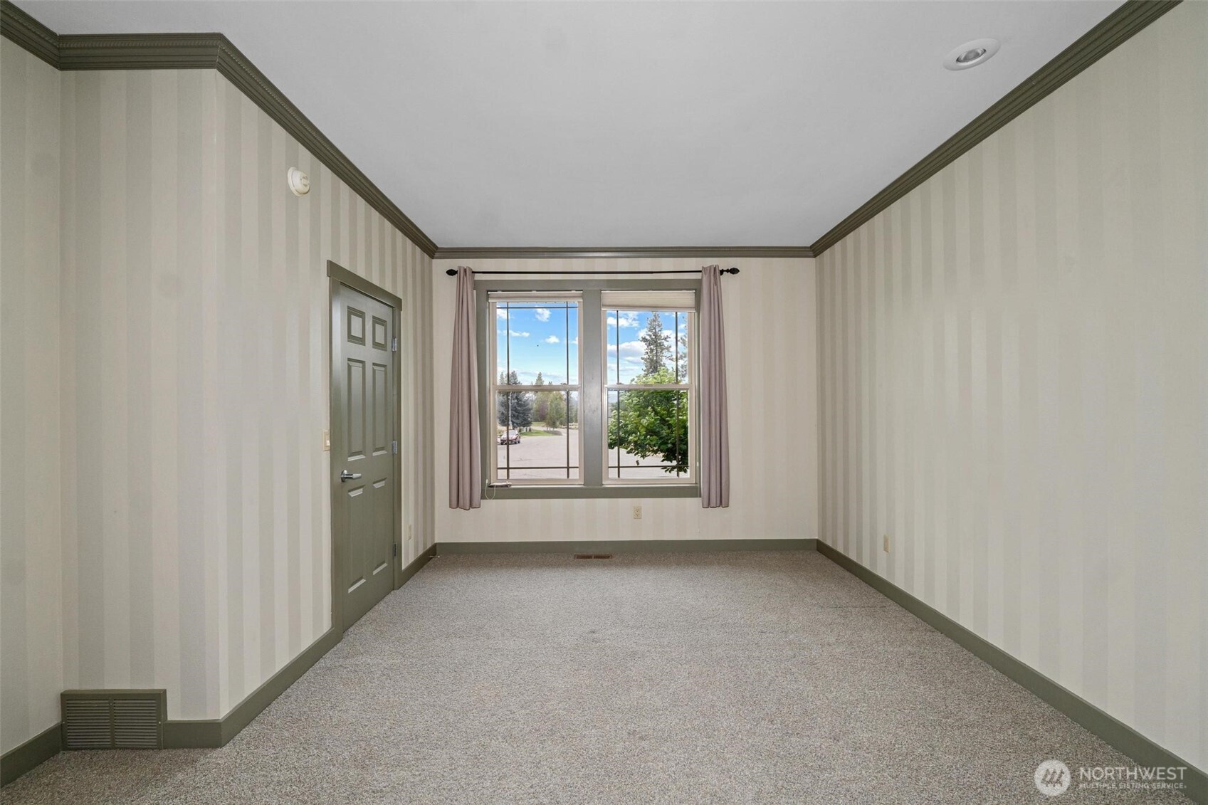 1900 Tamarack Street Colville, WA 99114 - Photo 17 of 40 a view of an empty room with a window