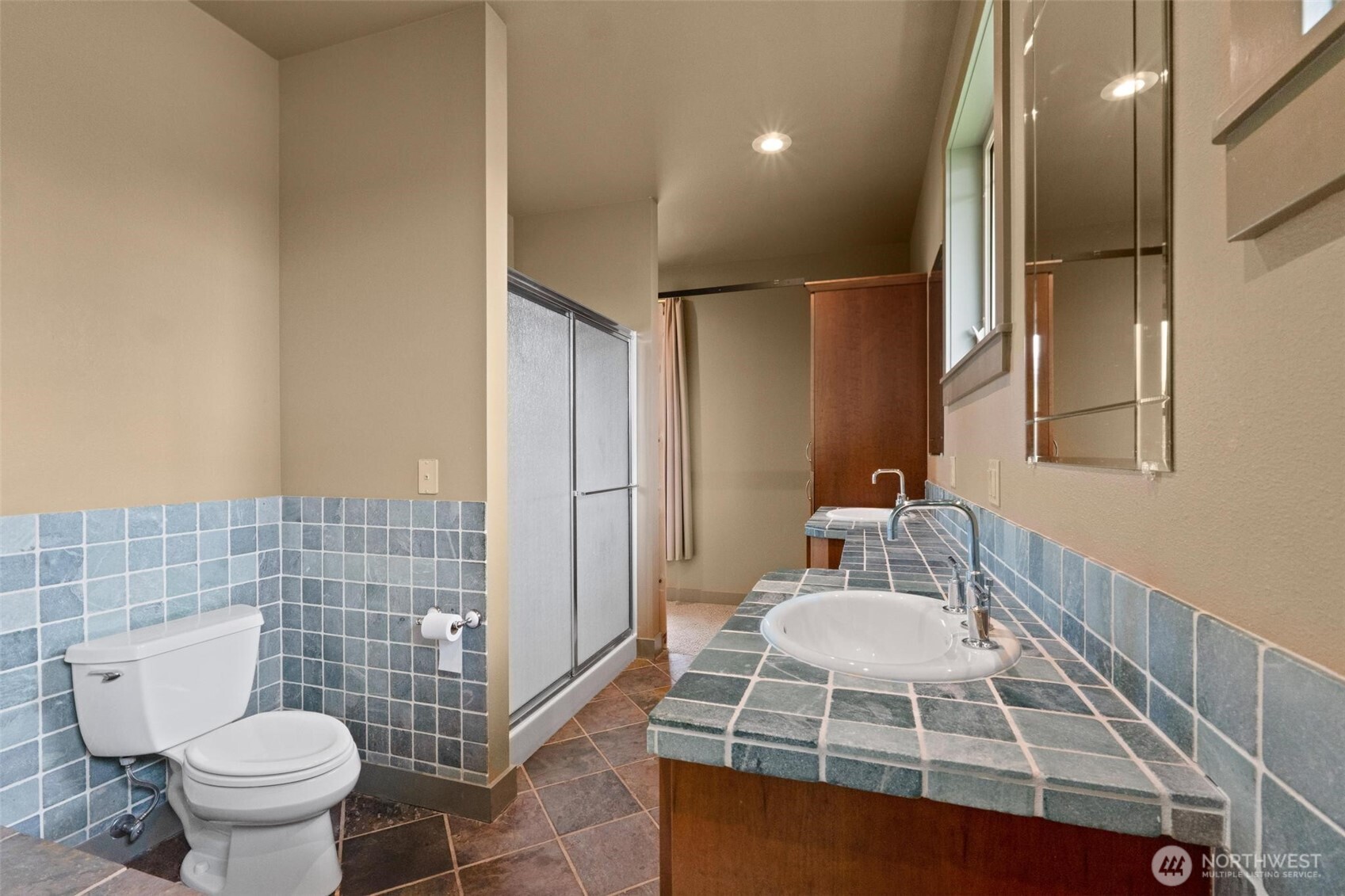 1900 Tamarack Street Colville, WA 99114 - Photo 33 of 40 a bathroom with a sink toilet and shower