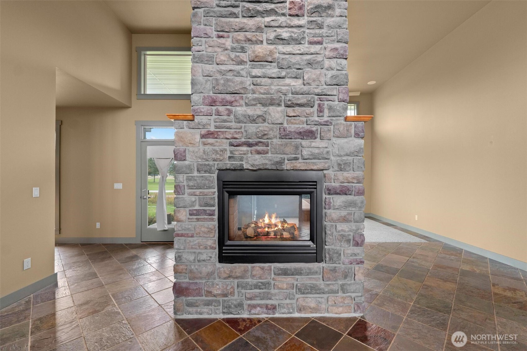 1900 Tamarack Street Colville, WA 99114 - Photo 6 of 40 a living room with a fireplace