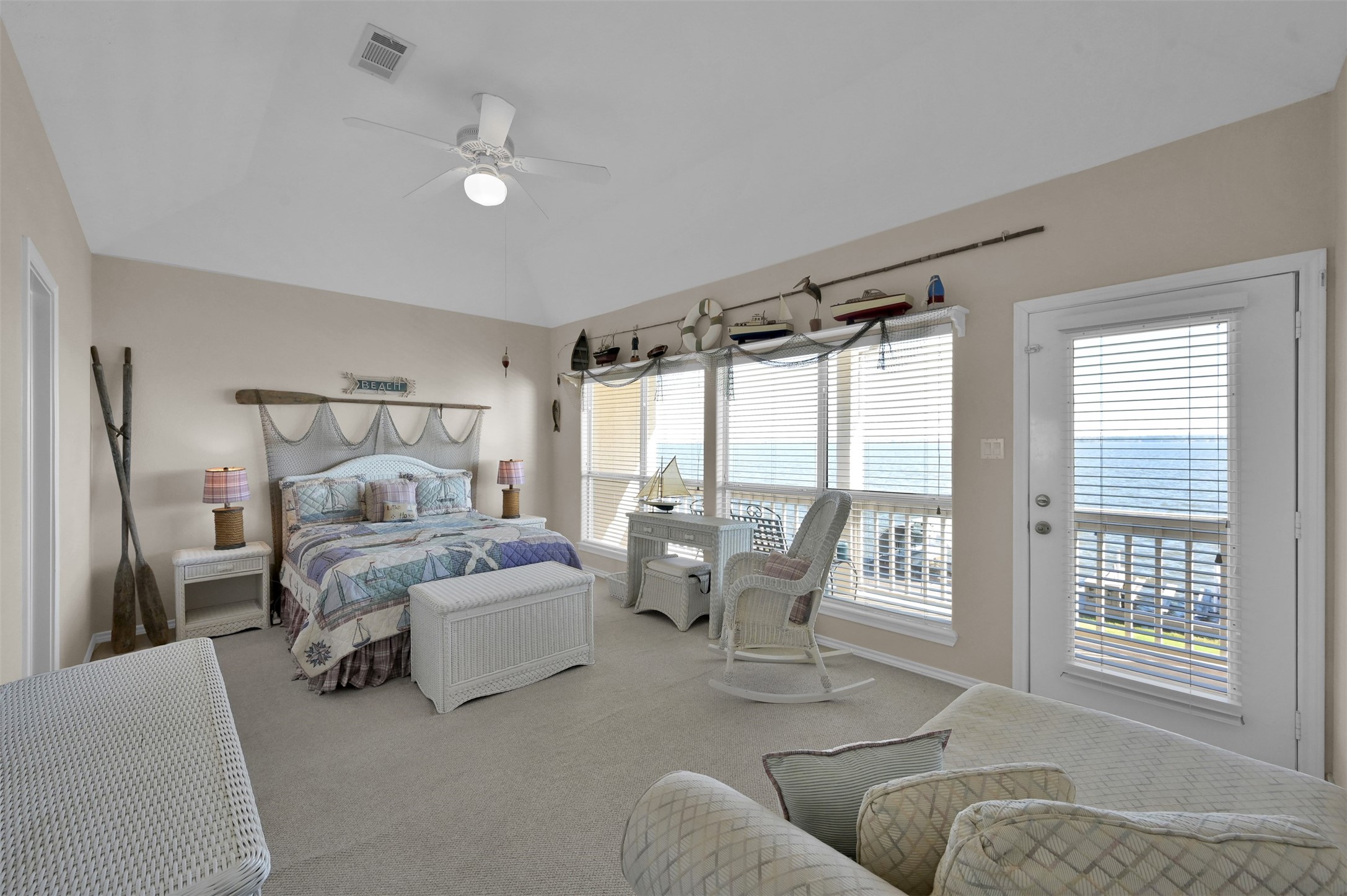 15 Regency Point Conroe, TX 77356 - Photo 14 of 32 a living room with furniture and large windows