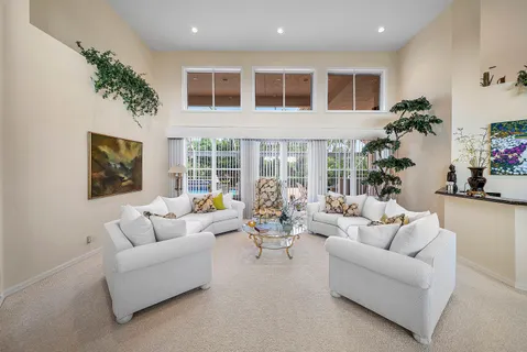 a view of a living room and dining room