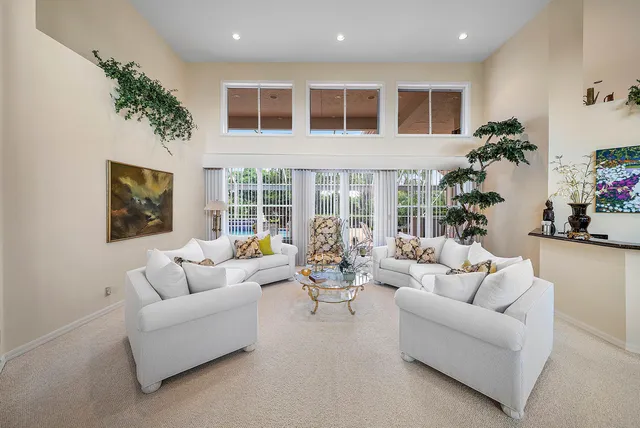 a view of a living room and dining room