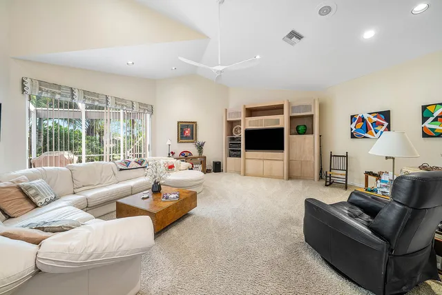 a bedroom with a bed and a desk