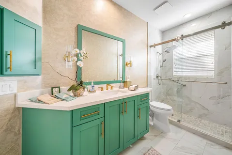 a workspace with a couch and a bookshelf