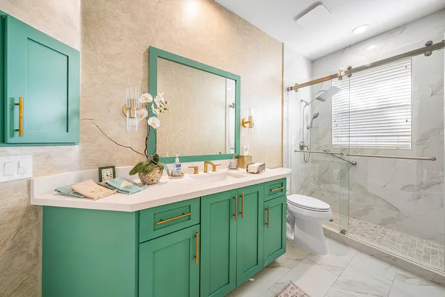 a workspace with a couch and a bookshelf