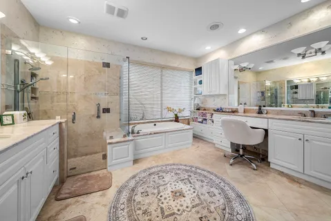 a view of a backyard with sitting area