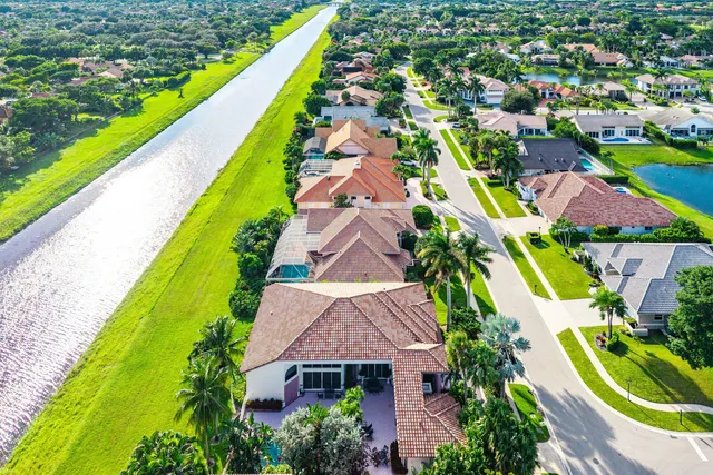 an aerial view of a swimming pool patio swimming pool and outdoor seating