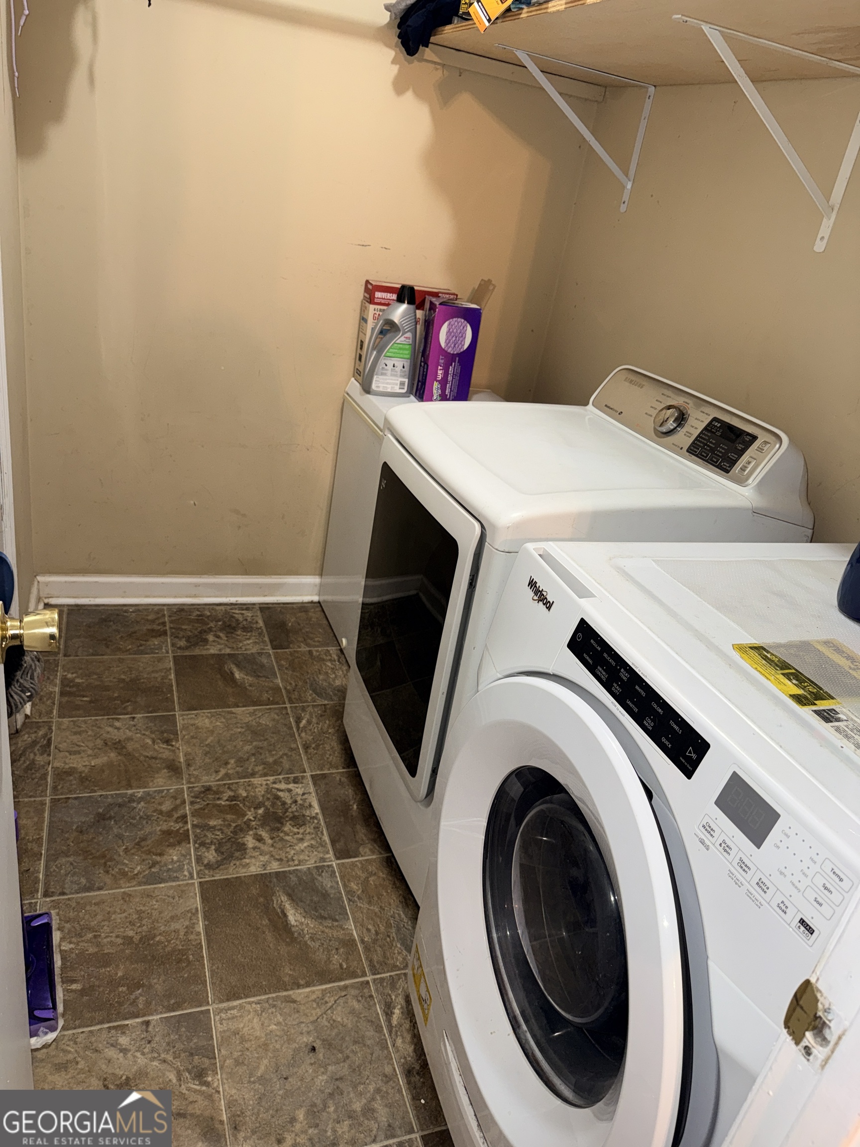 171 Candy Circle Winterville, GA 30683 - Photo 6 of 16 a utility room with dryer and washer