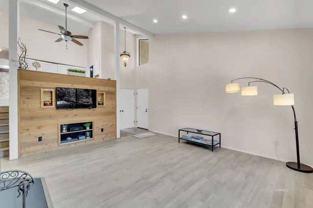 a kitchen with a sink stove and microwave
