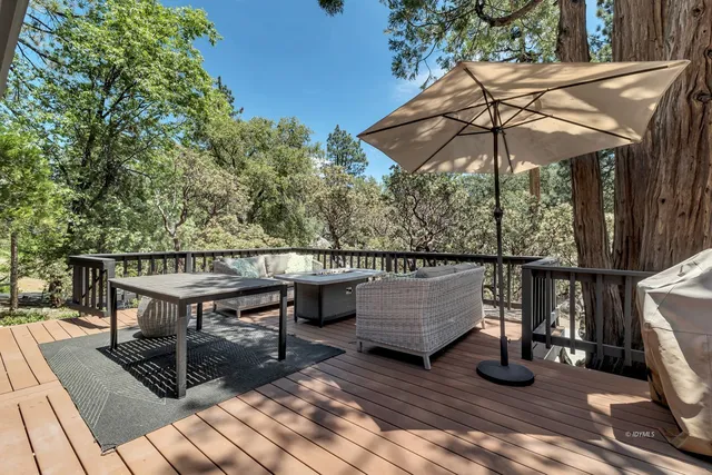 a view of a livingroom with wooden floor