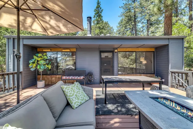 a spacious bathroom with a sink a vanity and a mirror
