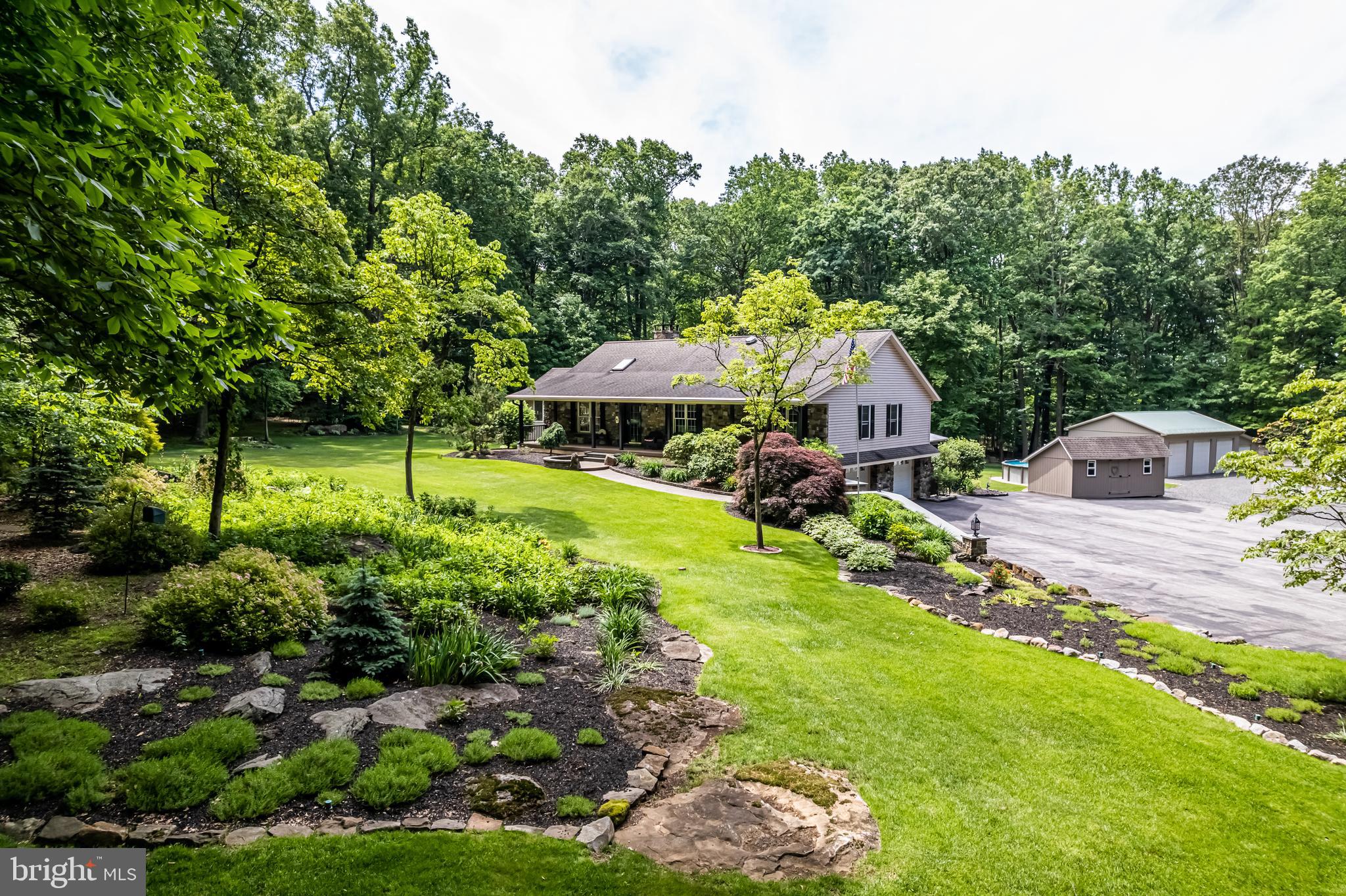 1949 Upper Ridge Road Green Lane, PA 18054 - Photo 3 of 92 Front view and rock garden