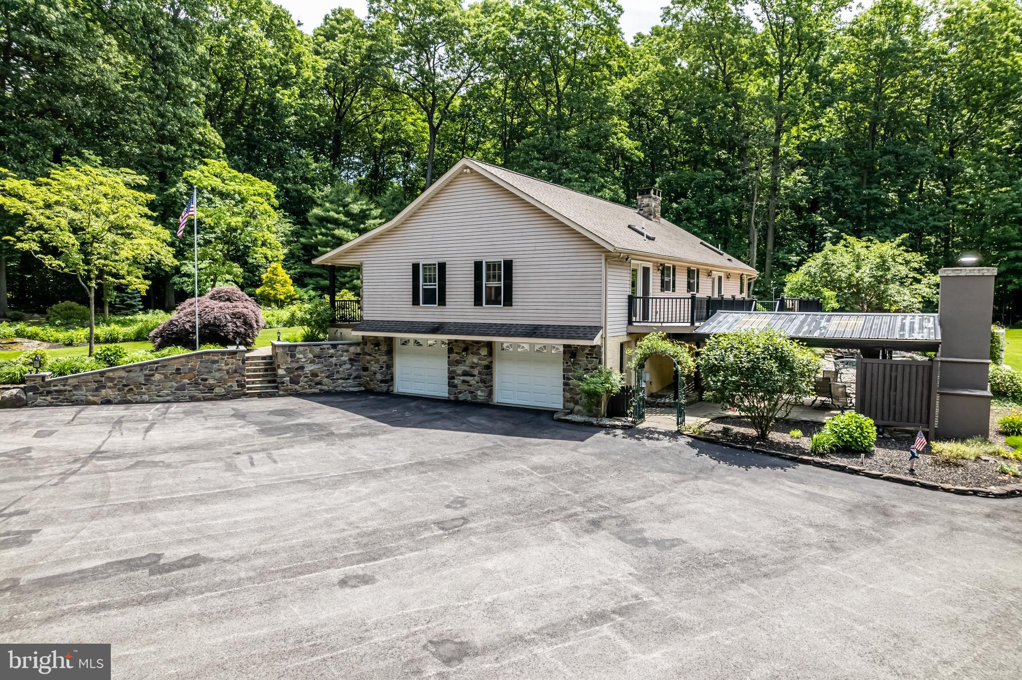 1949 Upper Ridge Road Green Lane, PA 18054 - Photo 56 of 92 Side of home and two car attached garage