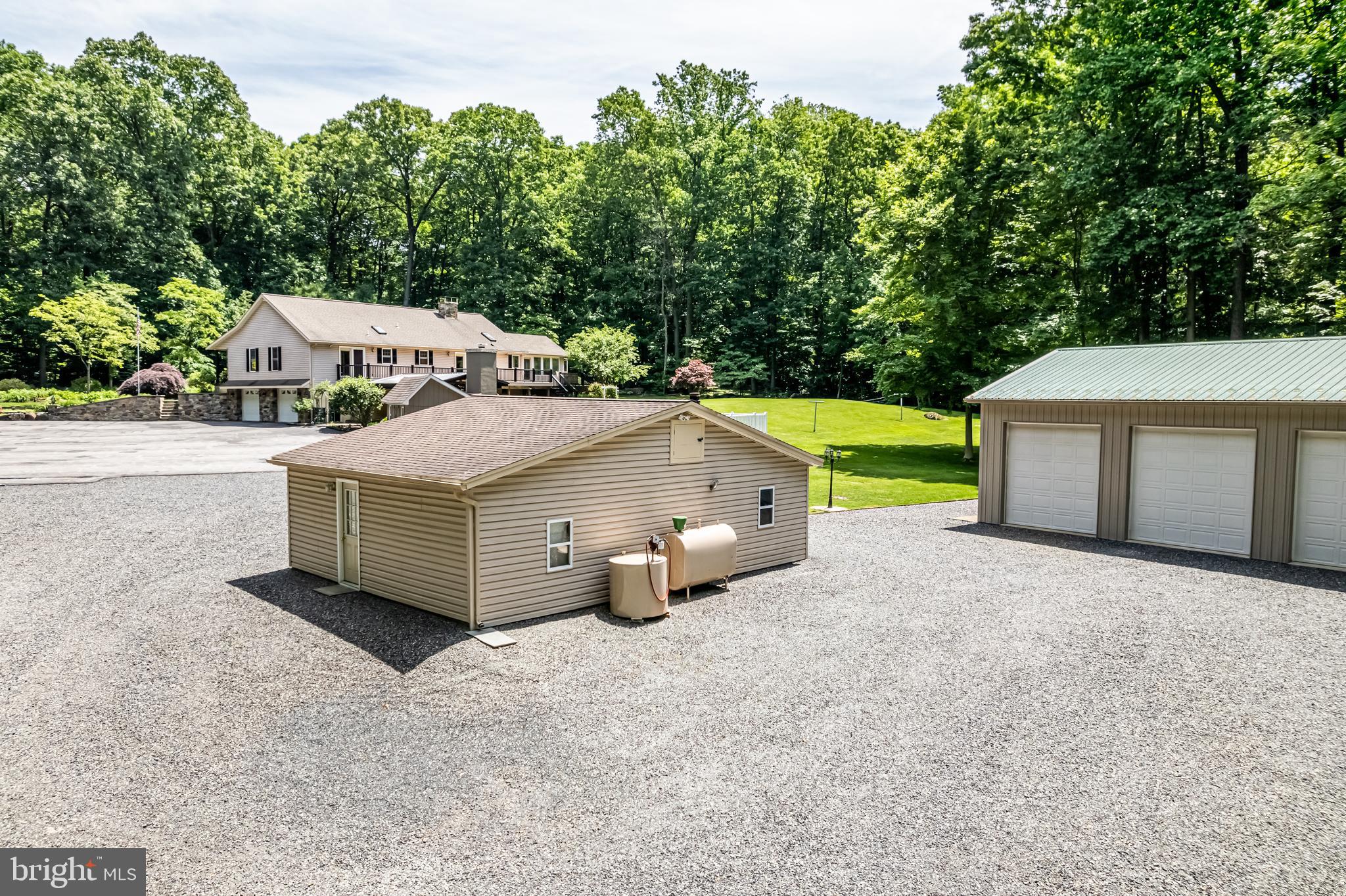 1949 Upper Ridge Road Green Lane, PA 18054 - Photo 66 of 92 Pole barn ,shed and rear of home
