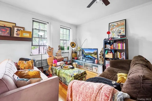 a living room with furniture and a window