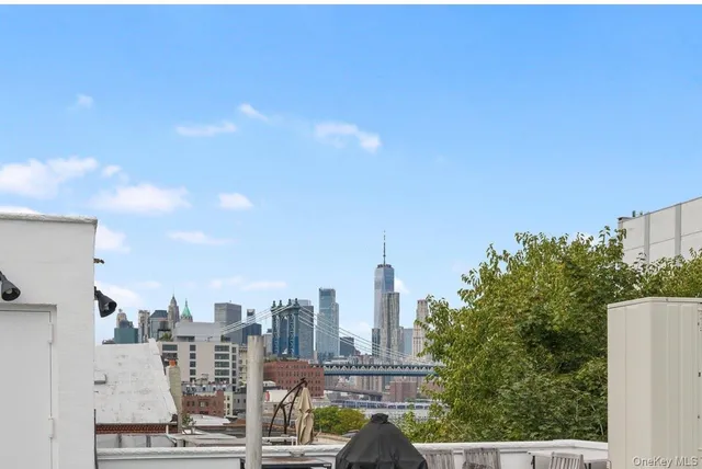 a view of a city with tall buildings